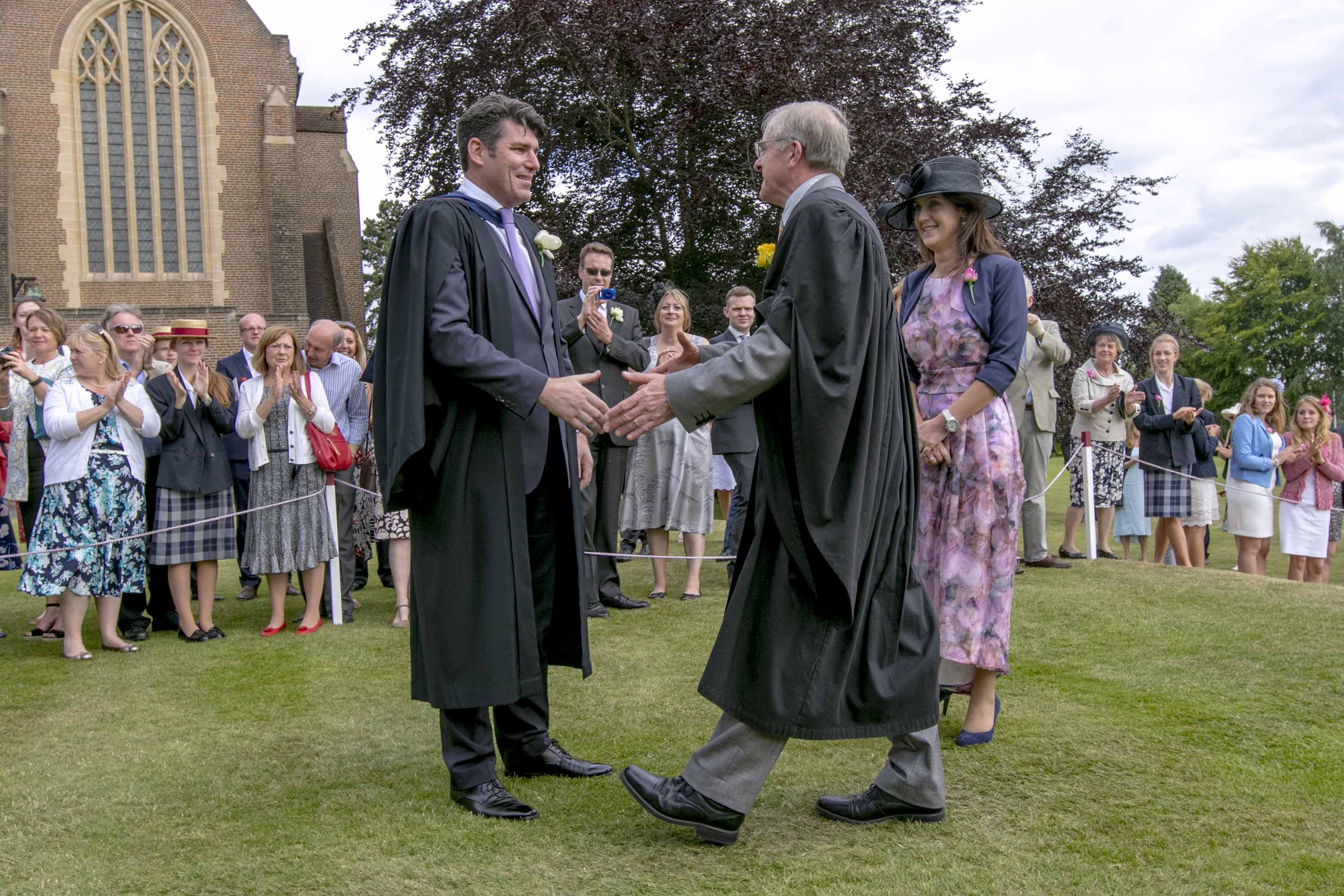 Mr Bowen with the Headmaster, Mr Clague during Call Over