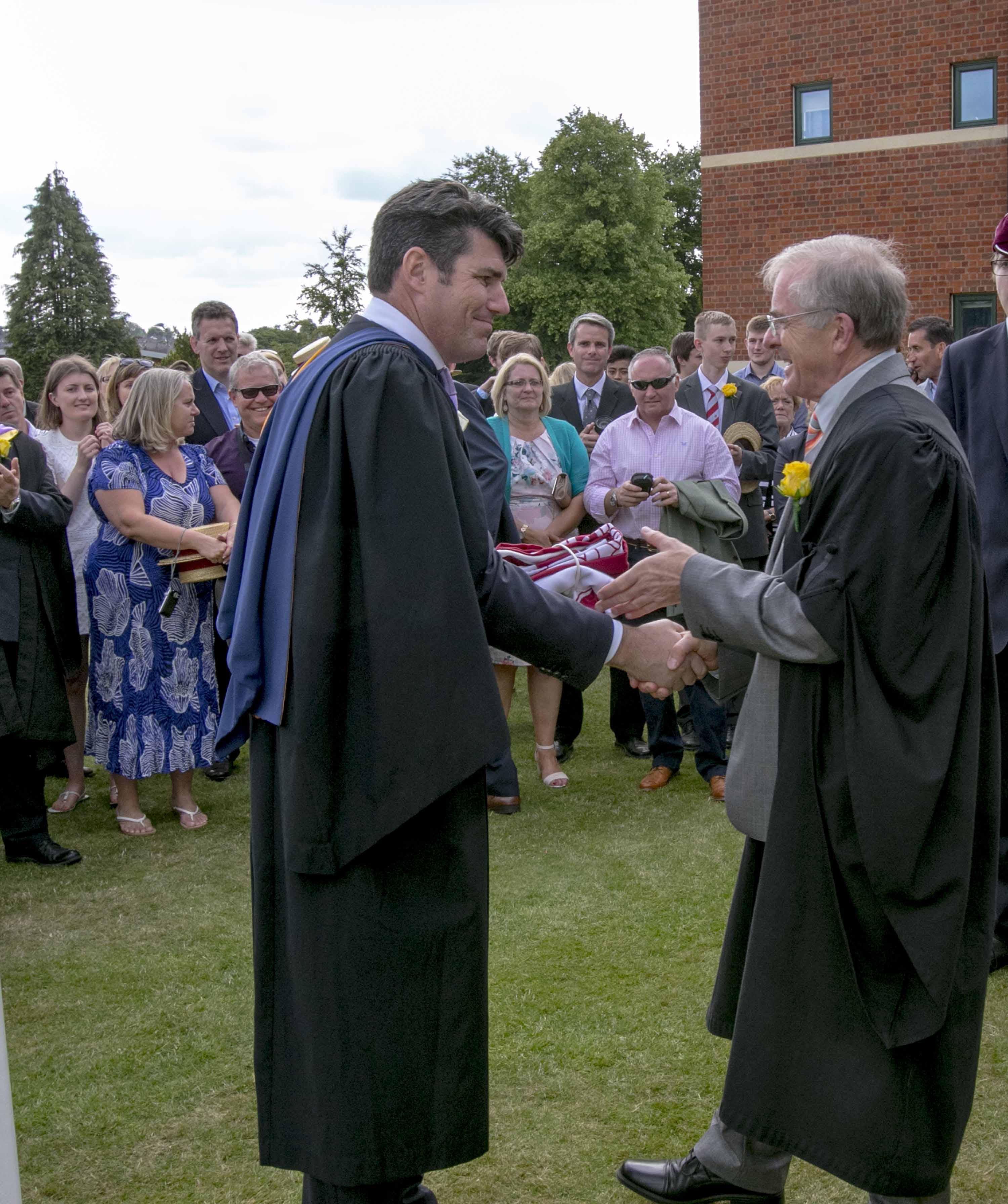 Handing over the School flag